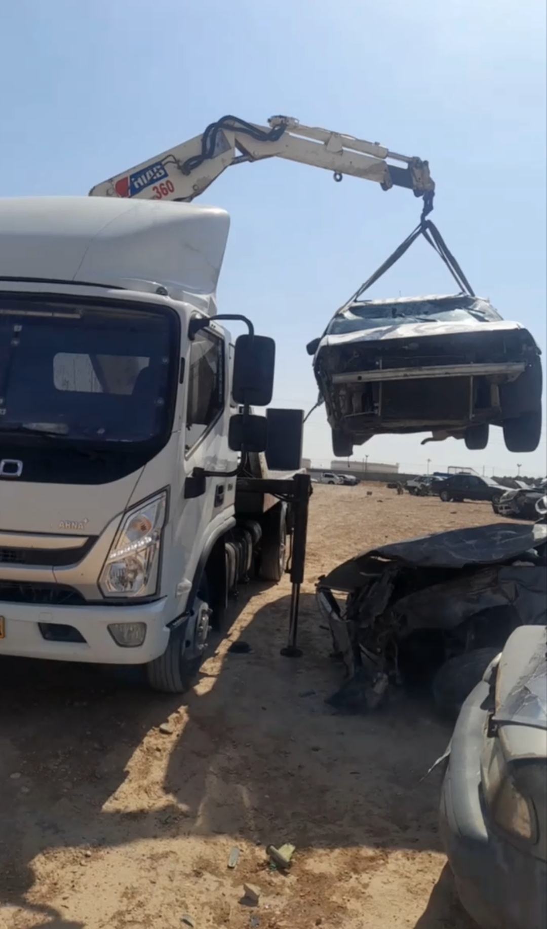 جرثقیل امداد خودرو شاهرود در حال حمل خودرو